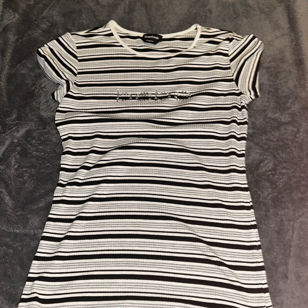 Bebe black and white cute striped sized M no rips or tares